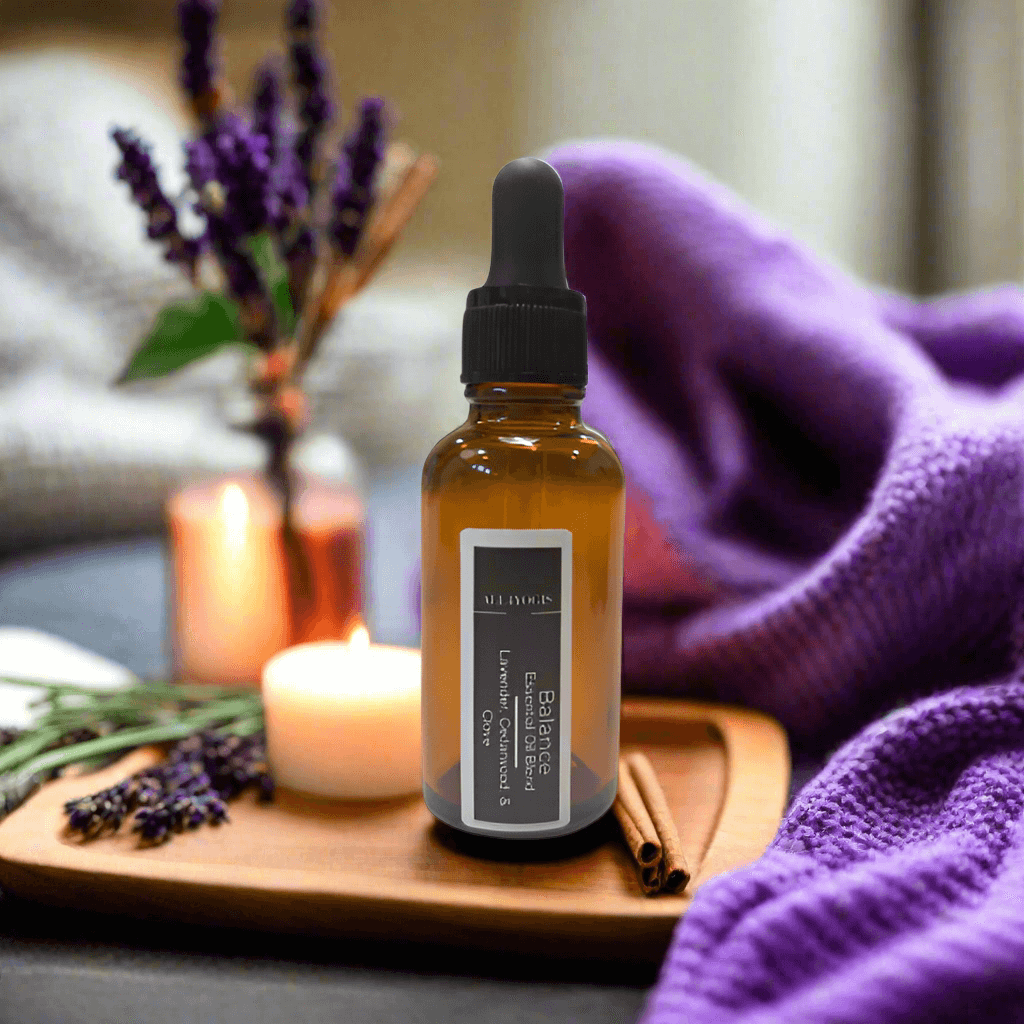 Aromatherapy image featuring The Power of Aromatherapy essential oil blend with lavender and a lit candle.