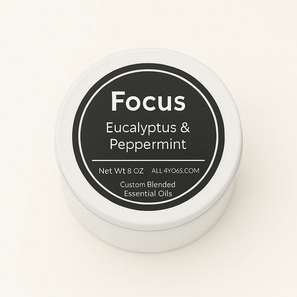 Focus 2 oz Tin Candle with eucalyptus and peppermint essential oils for stress relief and calming atmosphere.