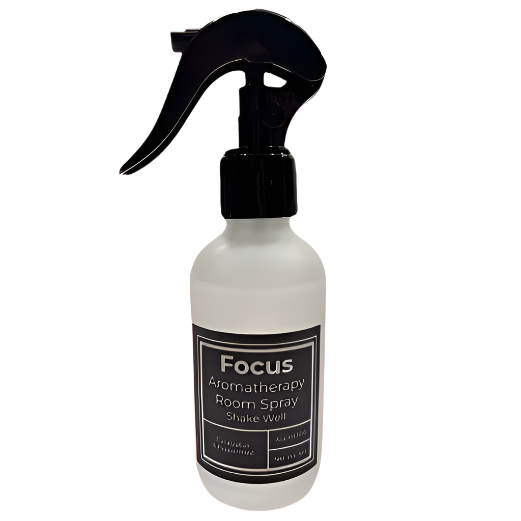 Aromatherapy room spray bottle labeled 'Focus' on a white background