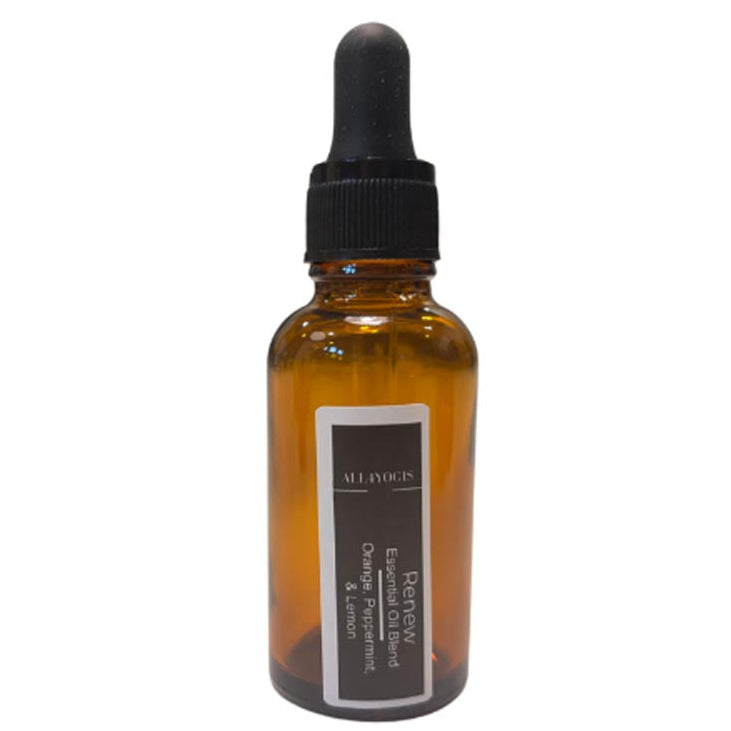 Renew Essential Oil blend in amber dropper bottle with orange, peppermint, and lemon for uplifting energy and wellness.