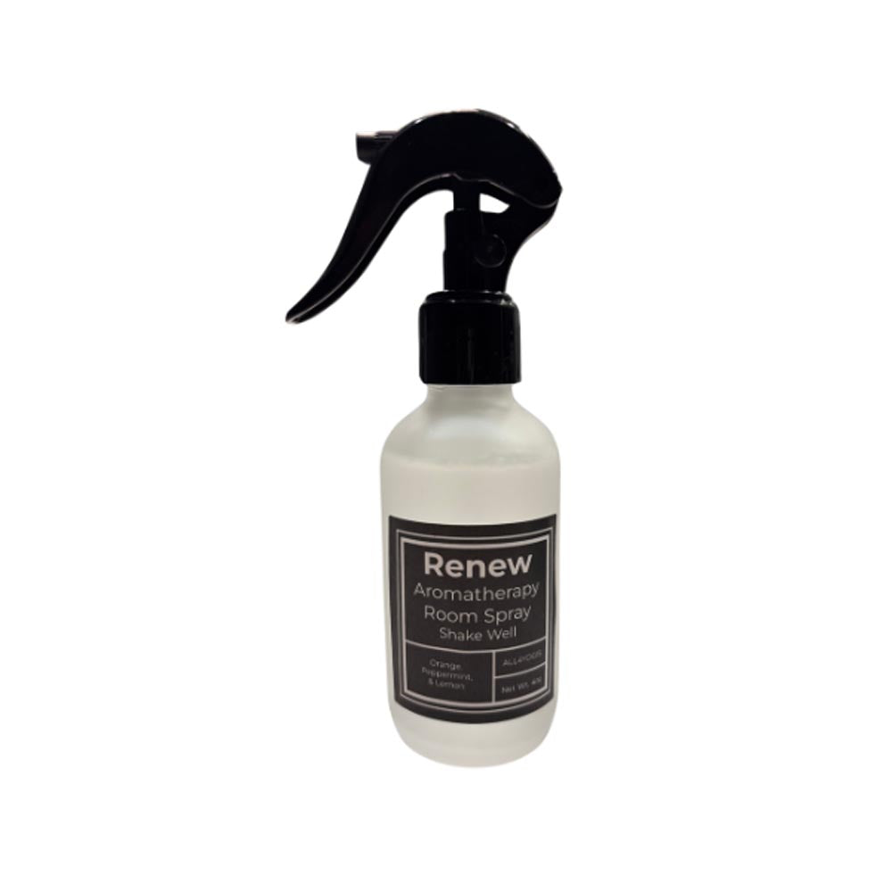 Renew Room Spray in a clear bottle with a spray nozzle, designed for uplifting energy and natural scent.