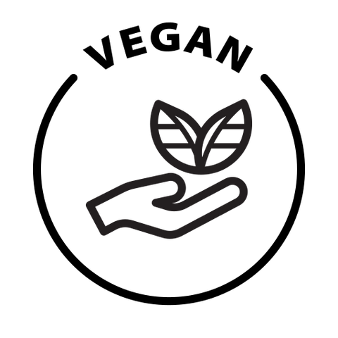 Hand holding a leaf symbolizing eco-friendly practices in wellness and self-care candles.